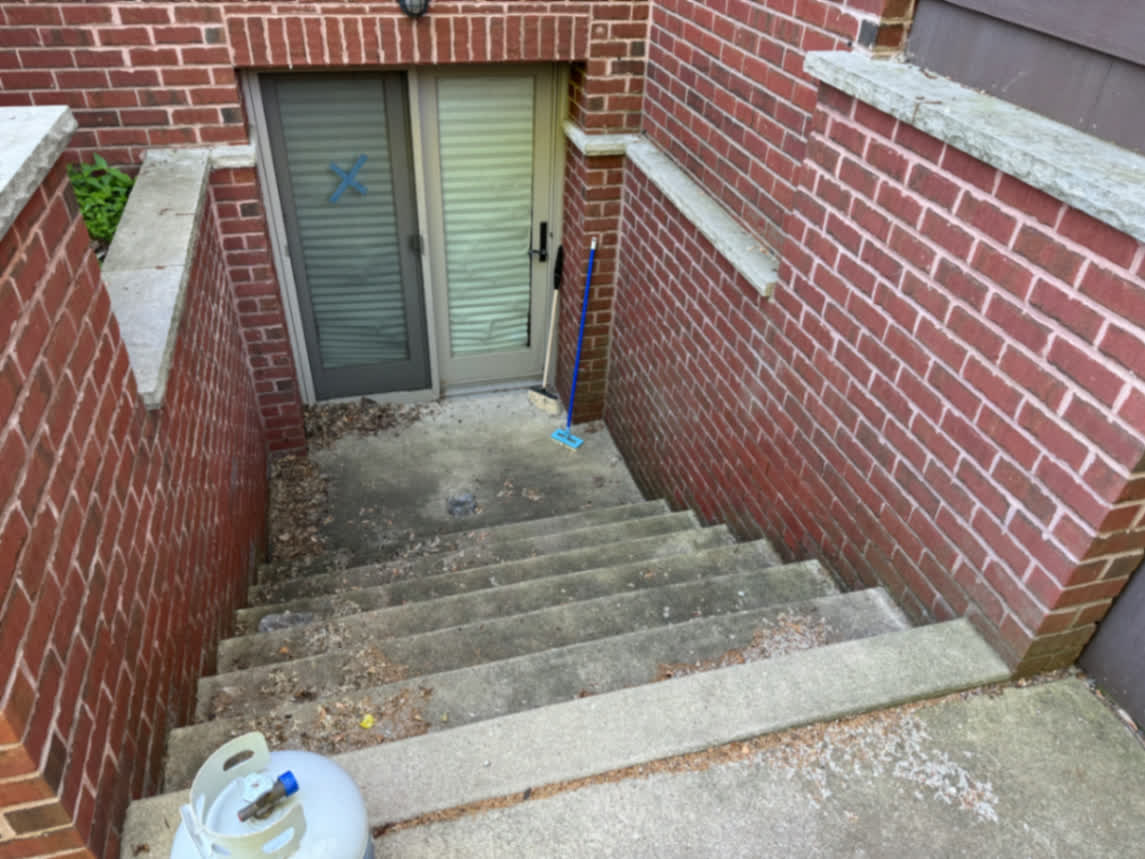 Concrete Stairwell Cleaning — before